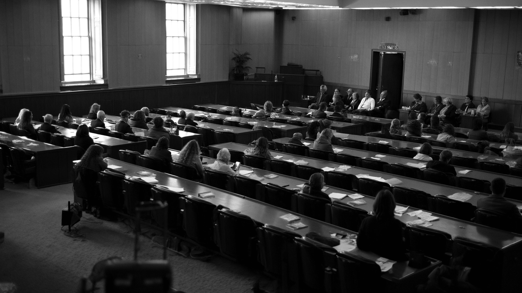 Council chamber, public gallery — illustration, not a field photograph
